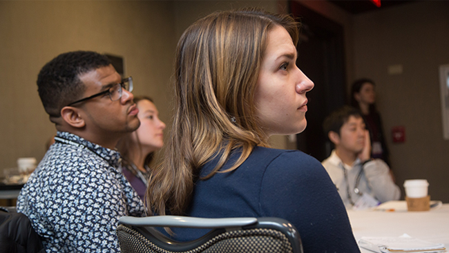 Attendees listening to a lecture at Neuroscience 2017