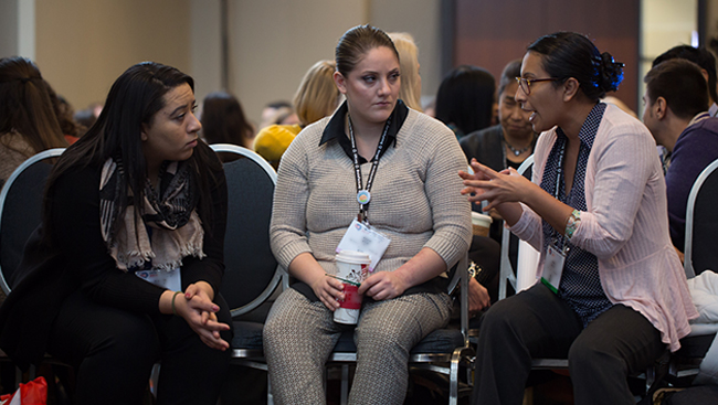 Neuroscience 2017 attendees having a discussion