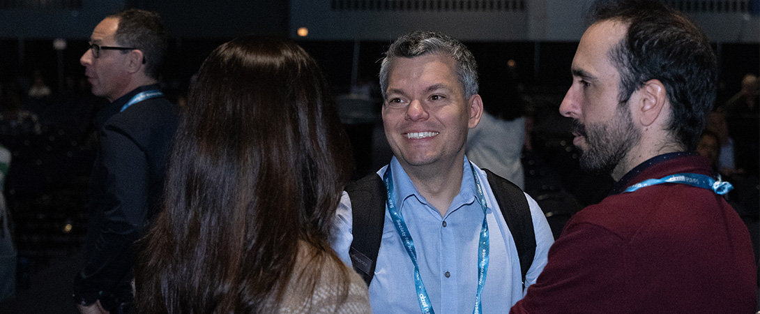 Attendees interacting