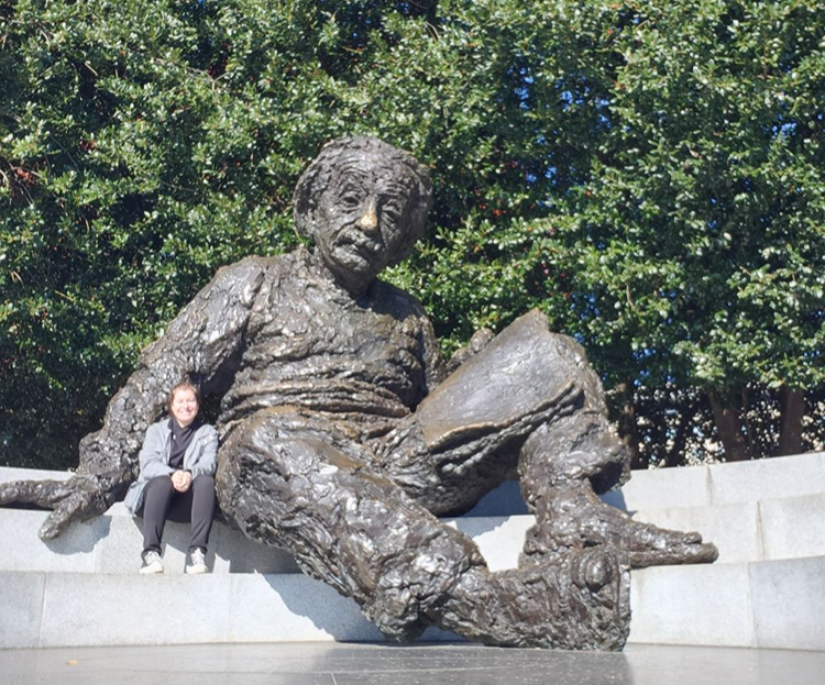 val with Einstein statue
