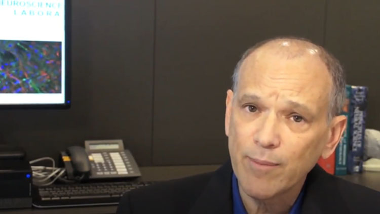 A man looks at the camera.