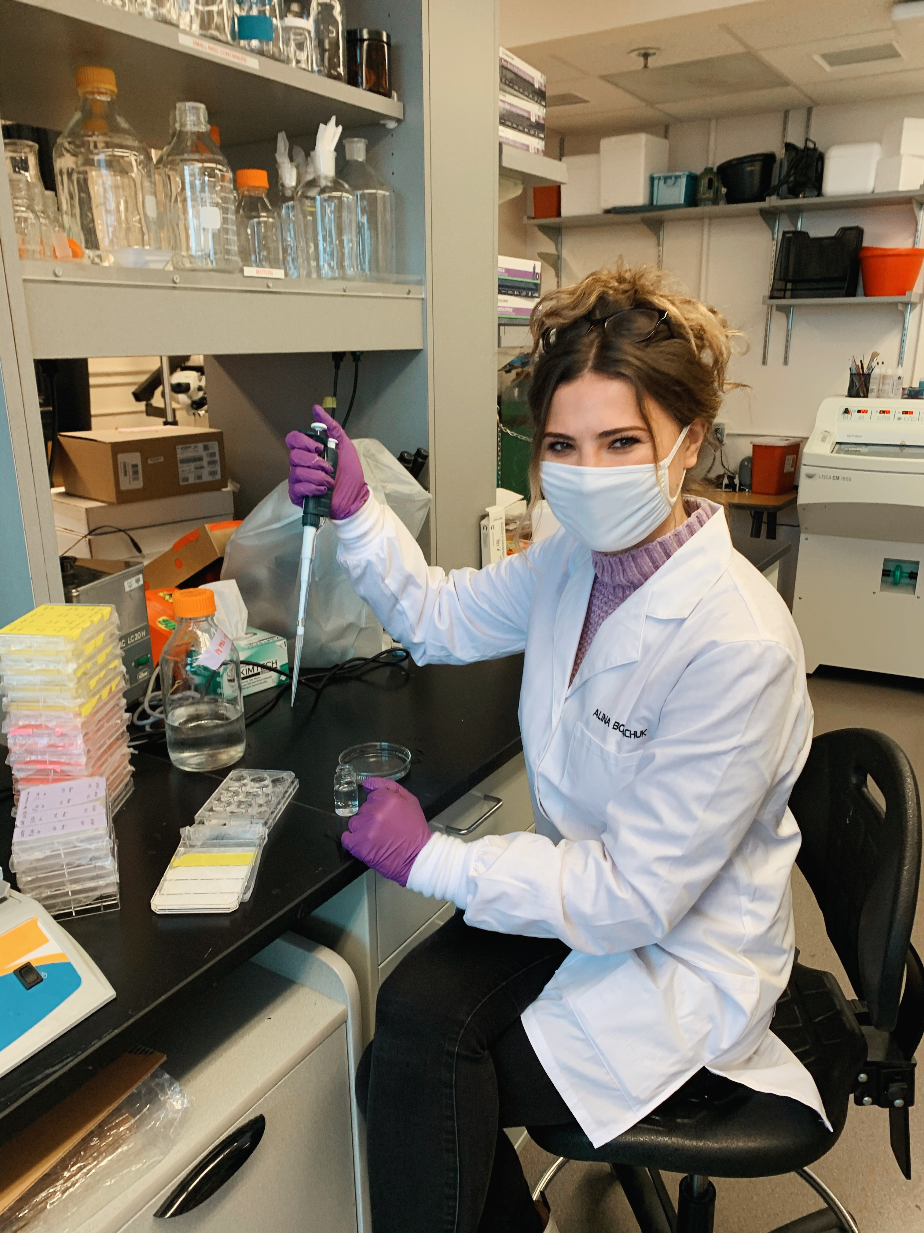 Naomi Lee and Noelle Waltenburg (BS, Chemistry, 2020) examine the contents of a test tube.