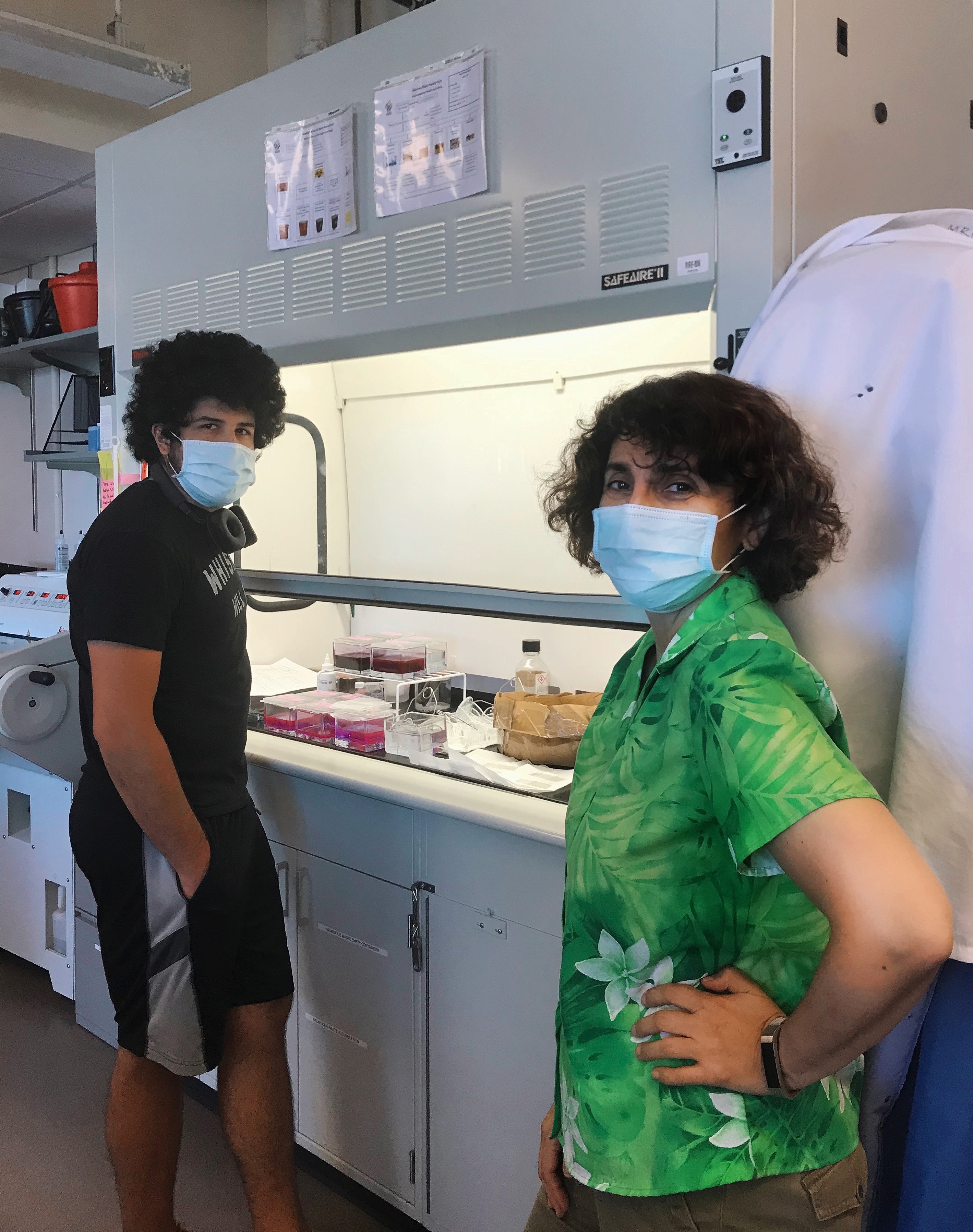 Bita Moghadam with poses with a lab student.