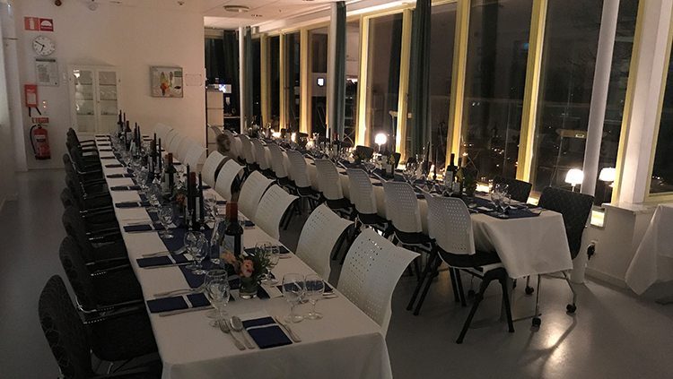 The conversion of lecture and lunch rooms into formal dining settings at the Pharmacology department, Gothenburg University.