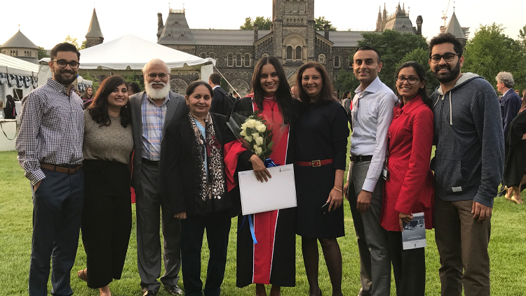 Soaleha Shams with her family at her convocation ceremony in Canada.