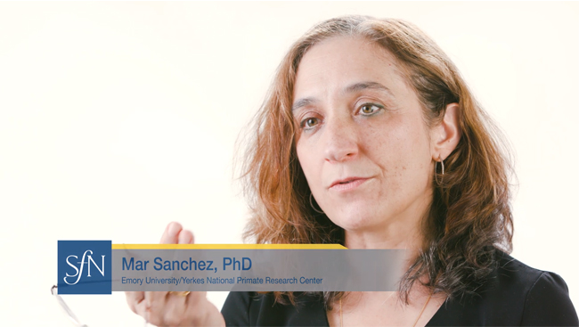 Image of Mar Sanchez speaking to an interviewer (off camera).