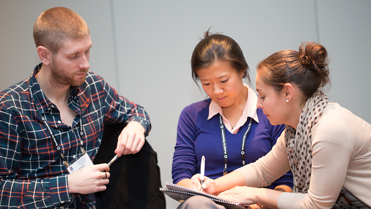 Meeting attendees discussing
