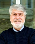 Headshot of Richard Olivo wearing a black sweater.