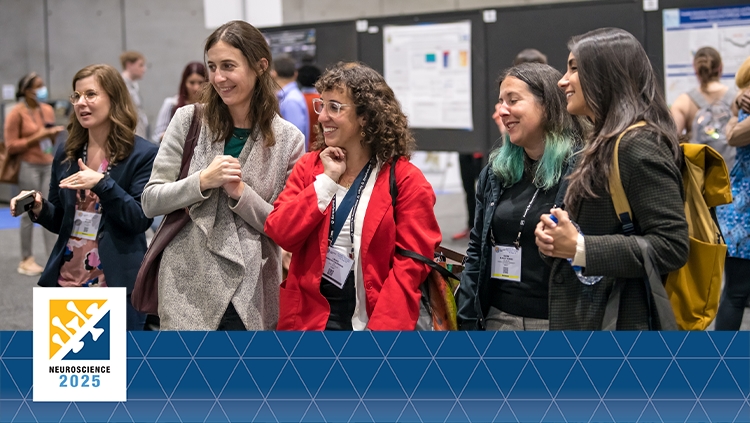 Image of attendees at Neuroscience conference reacting to a poster